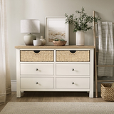 Farrow Basket 6 Drawer Chest from Roseland Furniture decorated with books pictures and vases in a room