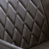 Thora-Faux-Leather-Brass-Leg-Brown from Roseland Furniture
