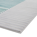 Gray-striped rug with alternating thick and thin lines on a white background, corner slightly lifted, revealing the rug's texture.
