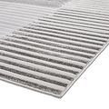 A striped gray and white rug on a white background, showcasing a partial view with an emphasis on texture and pattern.