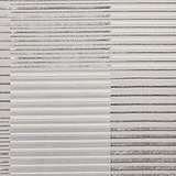 A textured surface with alternating horizontal bands of corrugated and smooth metallic appearance in grayscale, showing no discernible action or text, likely a material or abstract art.