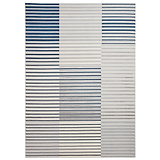 A patterned rug with alternating horizontal blue and grey stripes of varying thickness against a white background lies flat. There's no text present.