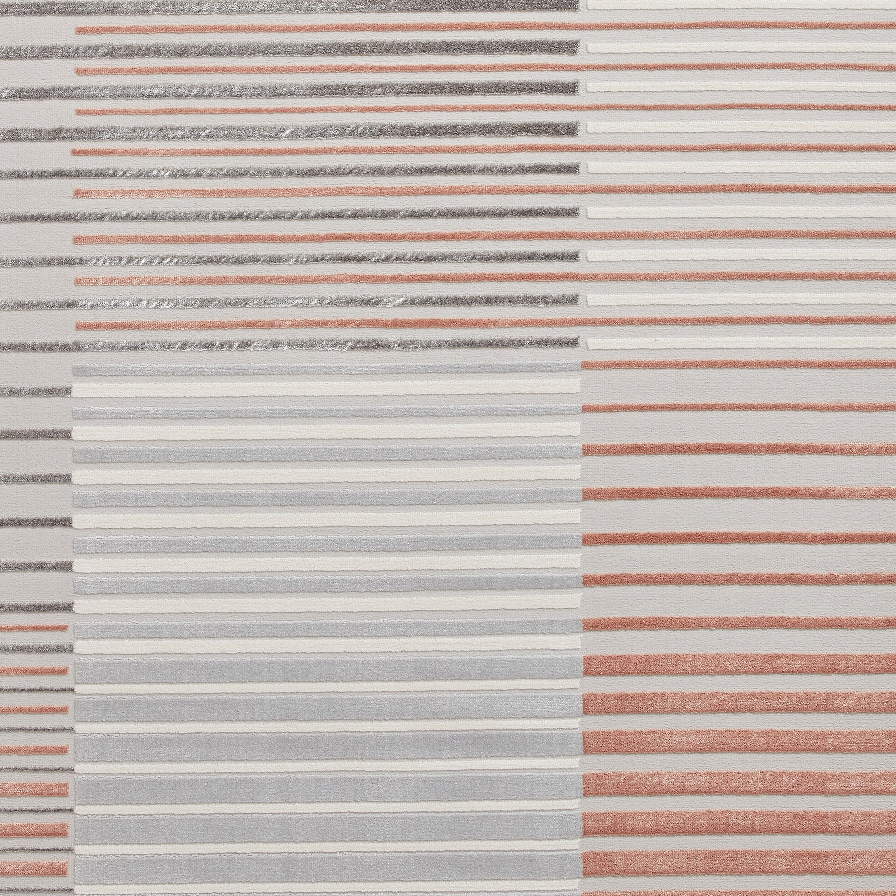 Parallel stripes in varying shades of grey and brown create a textured pattern on a flat surface.