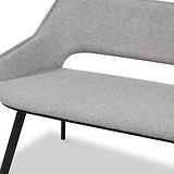 A grey fabric chair with a cutout backrest detail and black metal legs, displayed on a plain white background.