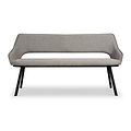 A modern gray fabric bench with a high backrest and angled black metal legs stands isolated against a white background.