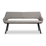 A modern gray fabric bench with a high backrest and angled black metal legs stands isolated against a white background.