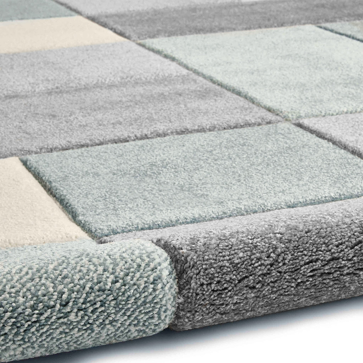 Brockton Grey Blue Square Patterned Hand Carved Rug from Roseland Furniture