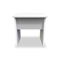 A white, minimalist desk stands centered against a white background, featuring a flat top and open shelf underneath.