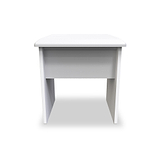 A white, minimalist desk stands centered against a white background, featuring a flat top and open shelf underneath.
