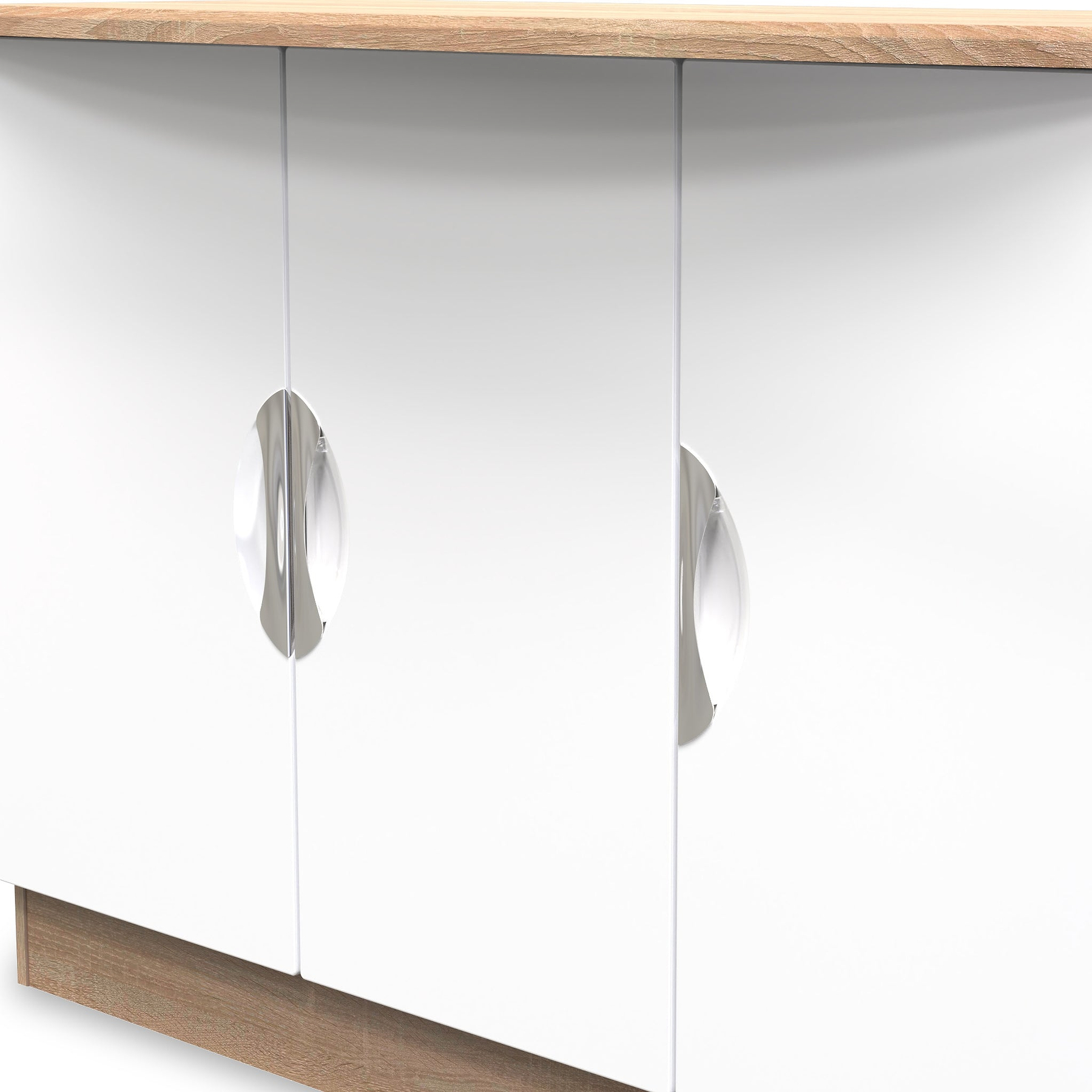 Two reflective cabinet knobs on a white door panel, positioned symmetrically, with a wooden countertop overhead.