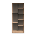 A tall, empty wooden bookcase with multiple shelves, against a plain white background.