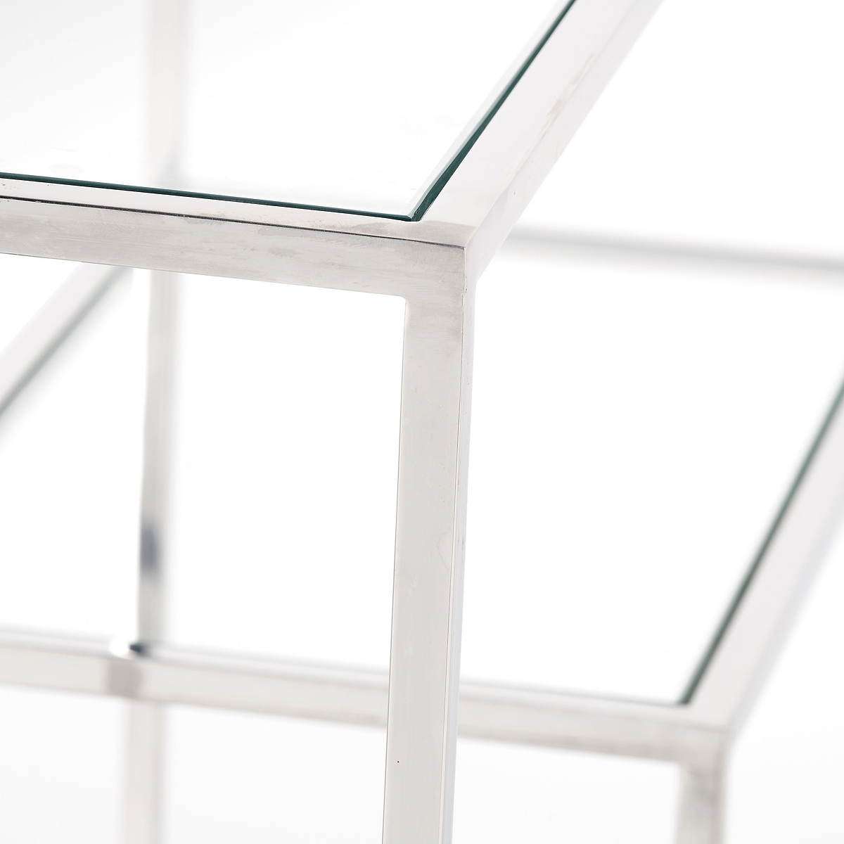 Aleandra Clear Glass and Silver Metal Console Table from Roseland Furniture