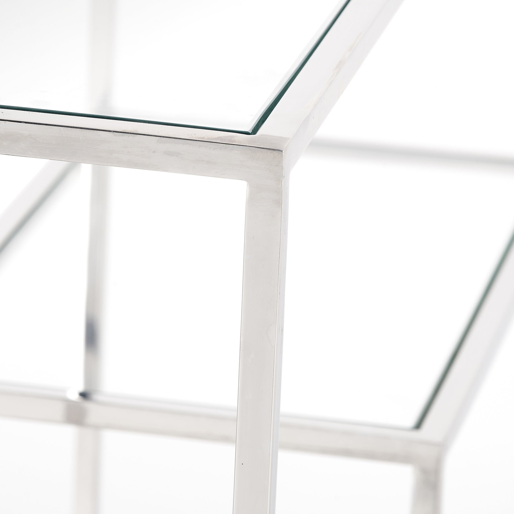 Aleandra Clear Glass and Silver Metal Console Table from Roseland Furniture