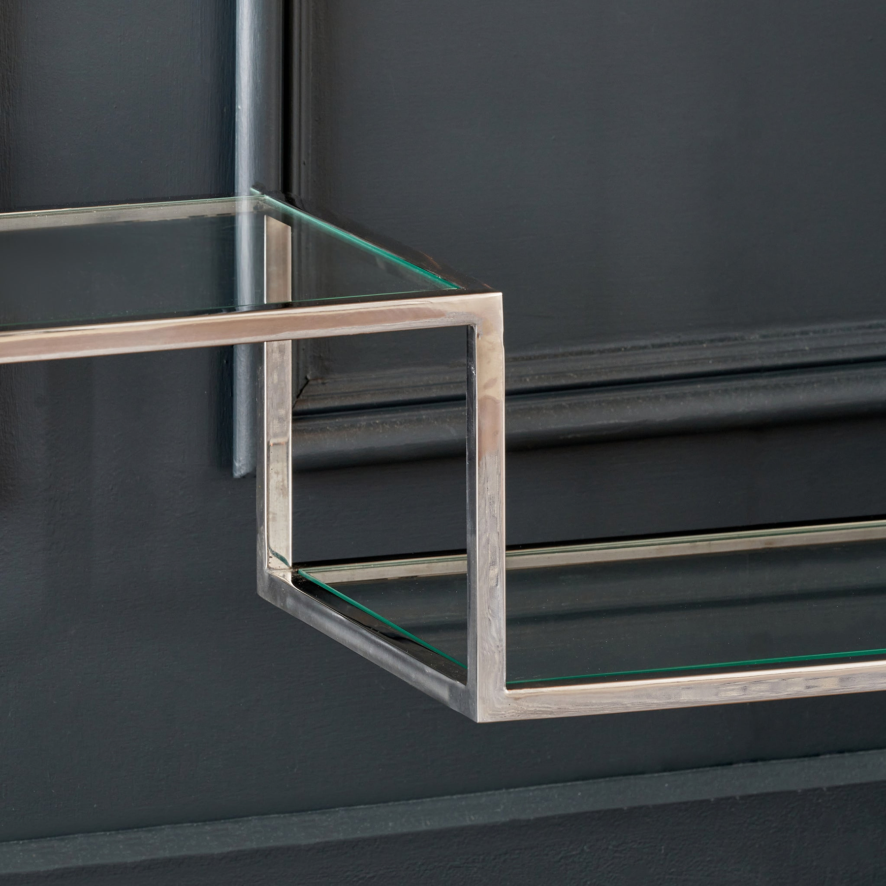 Aleandra Clear Glass and Silver Metal Console Table from Roseland Furniture