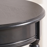 Heritage Black Pine Wood Round Accent Table from Roseland Furniture
