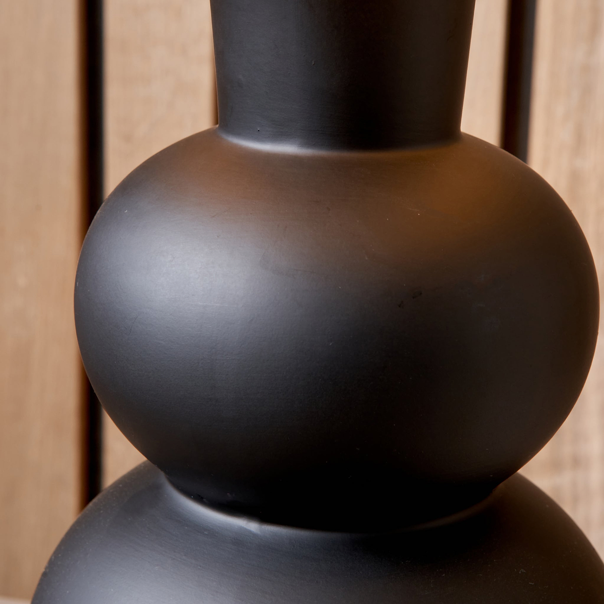 Aaliyah Curved Bottle Ceramic Table Lamp Black from Roseland Furniture