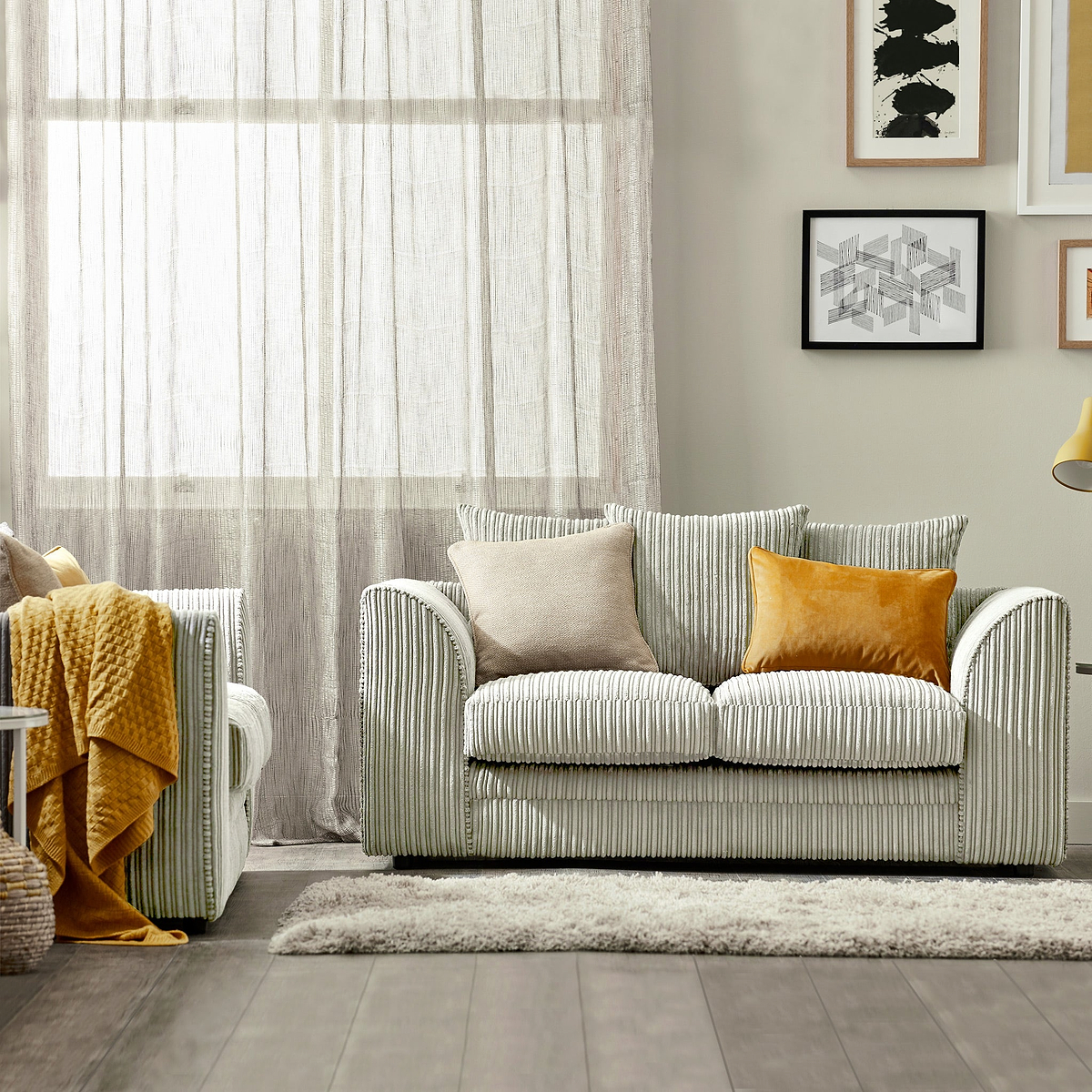 Bletchley Cream Jumbo Cord 2 Seater Sofa from Roseland Furniture
