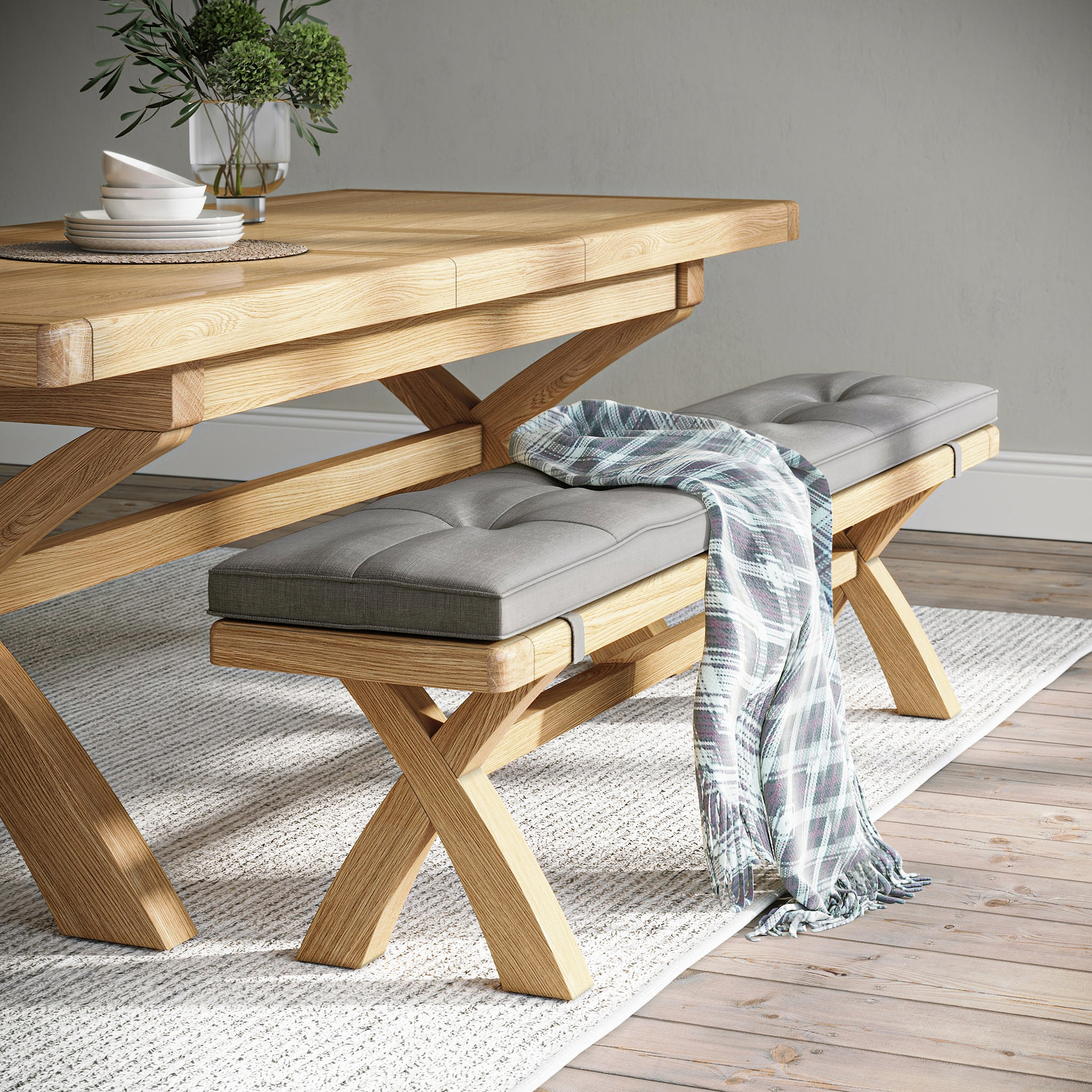 Portland Oak 200cm Cross Legged Dining Bench with beige cushion