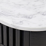 Close-up of a Shorwell Black & Marble 1 Drawer Side Table tabletop with gray veining and a dark wood slatted base.