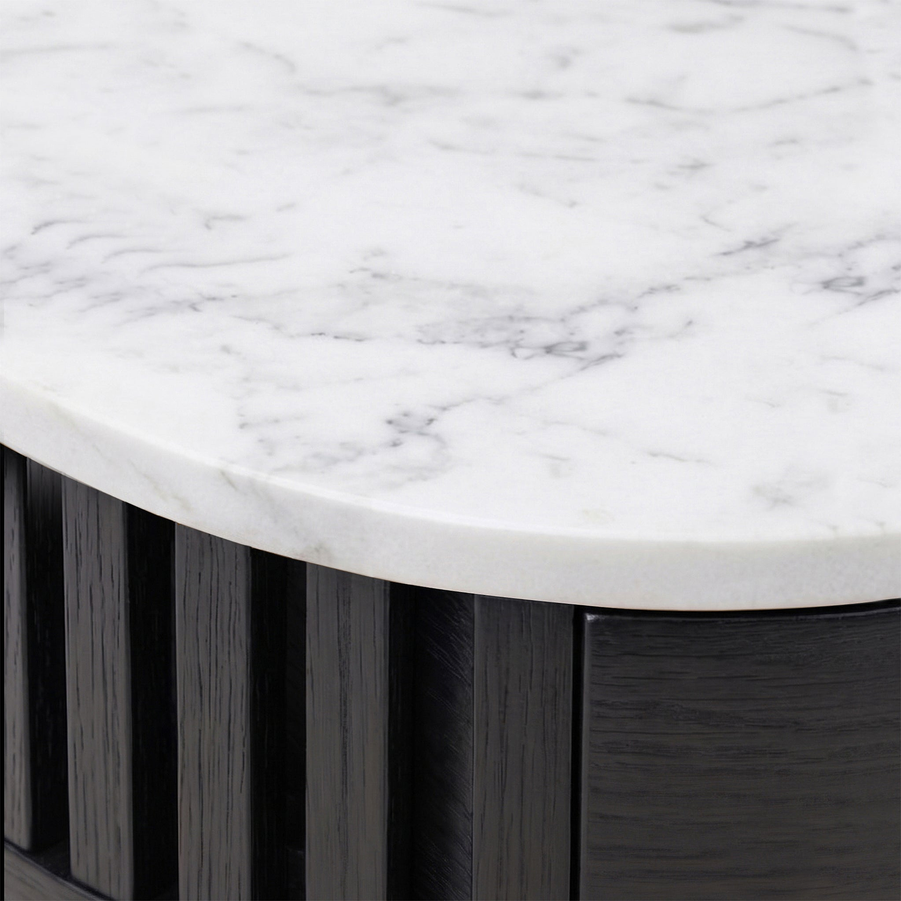 Close-up of a Shorwell Black & Marble 1 Drawer Side Table tabletop with gray veining and a dark wood slatted base.