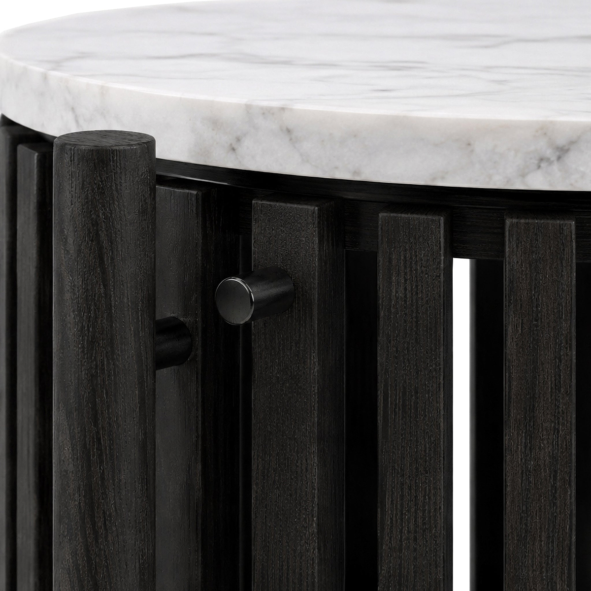 Close-up of Shorwell Black & Marble 1 Door Side Table with a white marble top and a dark charcoal black slatted base with a round metal pull handle.