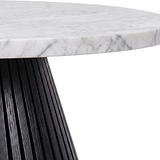 Close-up of a Shorwell Black & Marble 80cm Round Coffee Table with a white marble top featuring gray veining and a black fluted pedestal base, isolated on a white background.