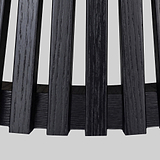 Close-up of a Shorwell Black & Marble 80cm Round Coffee Table slatted panel design with vertical blackened wood bars, shown against a plain light gray background.