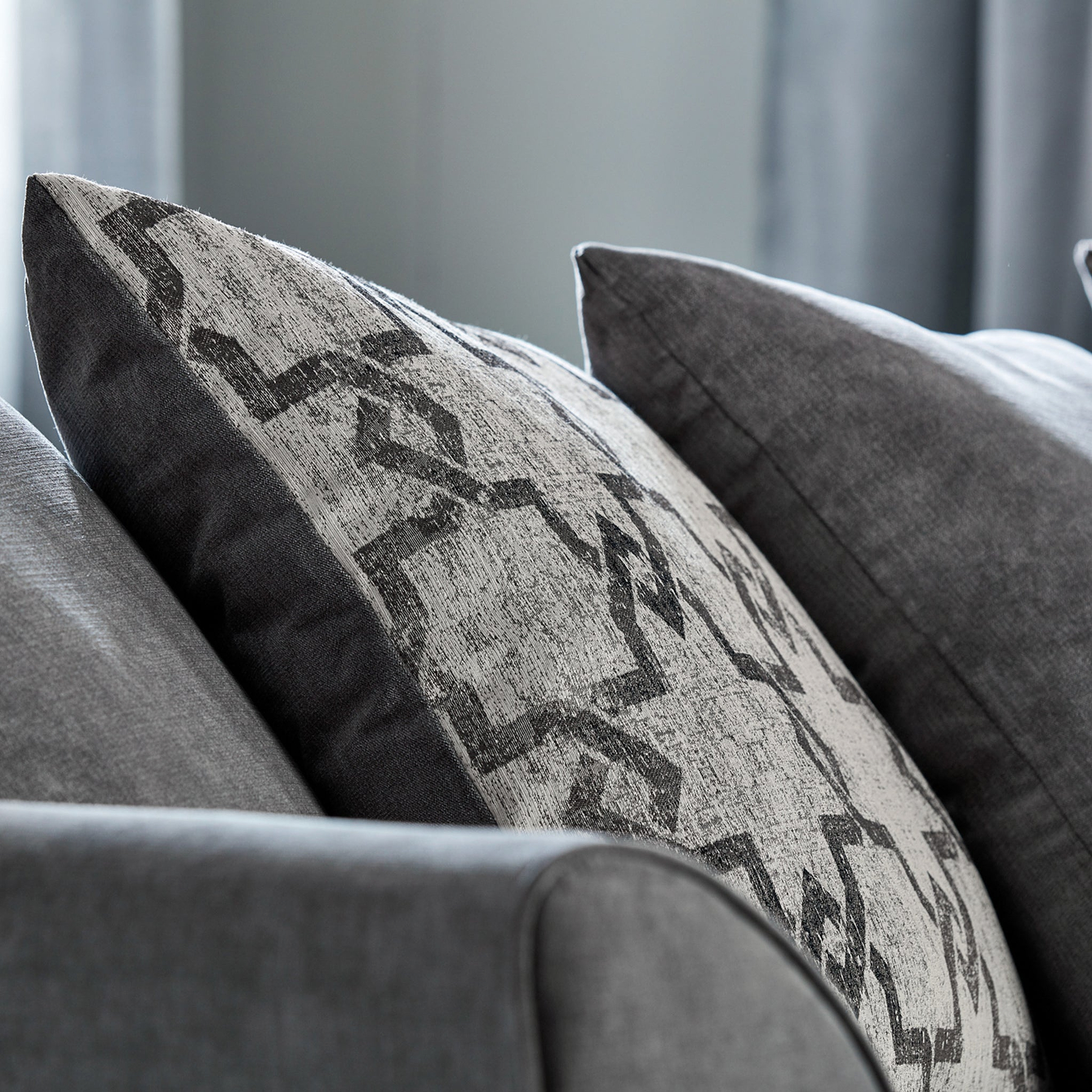 Fernley-3-seater-sofa-charcoal-cushions-pewter from Roseland Furniture