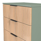 Jago-slatted-effect-5-drawer-chest-green from Roseland Furniture