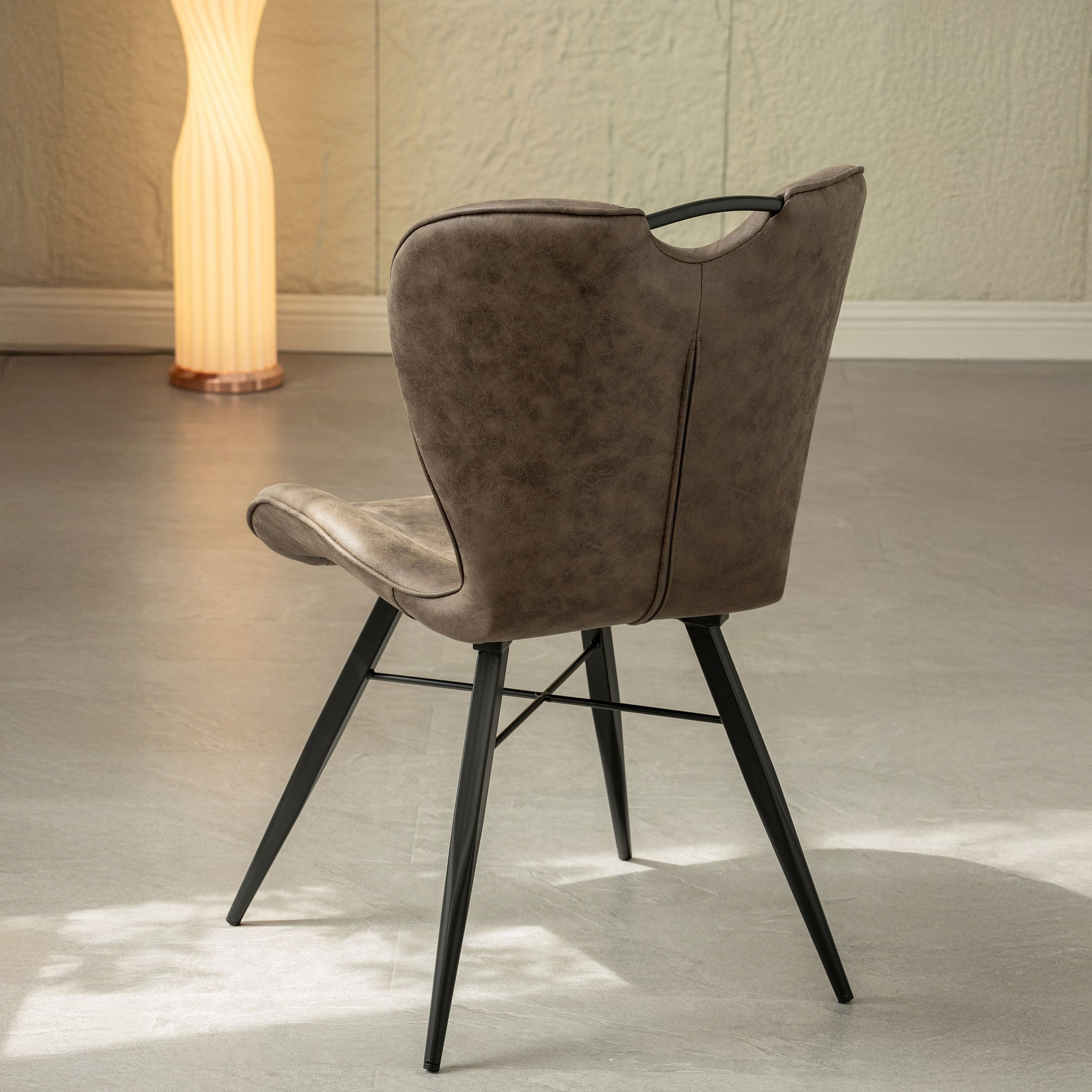 Peran Brown Soft Faux Leather Dining Chair from Roseland Furniture