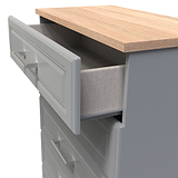 A 3D rendering of a modern drawer partially open, revealing a fabric-lined interior, with a wooden countertop above, set against a plain background.