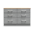 A standalone gray cabinet with six drawers and metal handles, featuring a wooden countertop, is set against a white background.