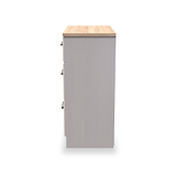 A tall, freestanding gray bathroom cabinet with a wooden top and silver handles against a white background.
