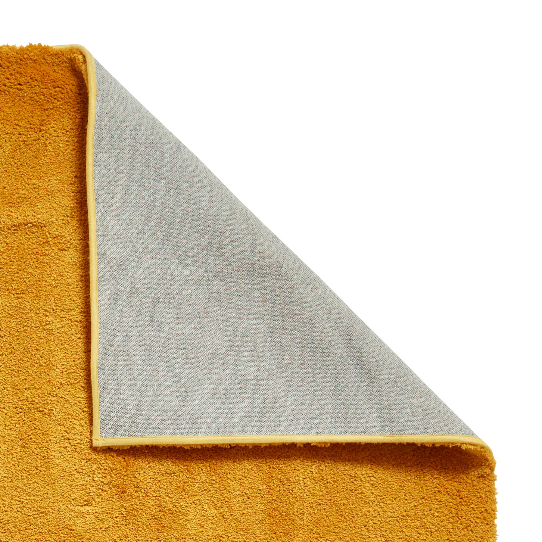 Mackenzie Washable Shaggy Rug Ochre from Roseland Furniture