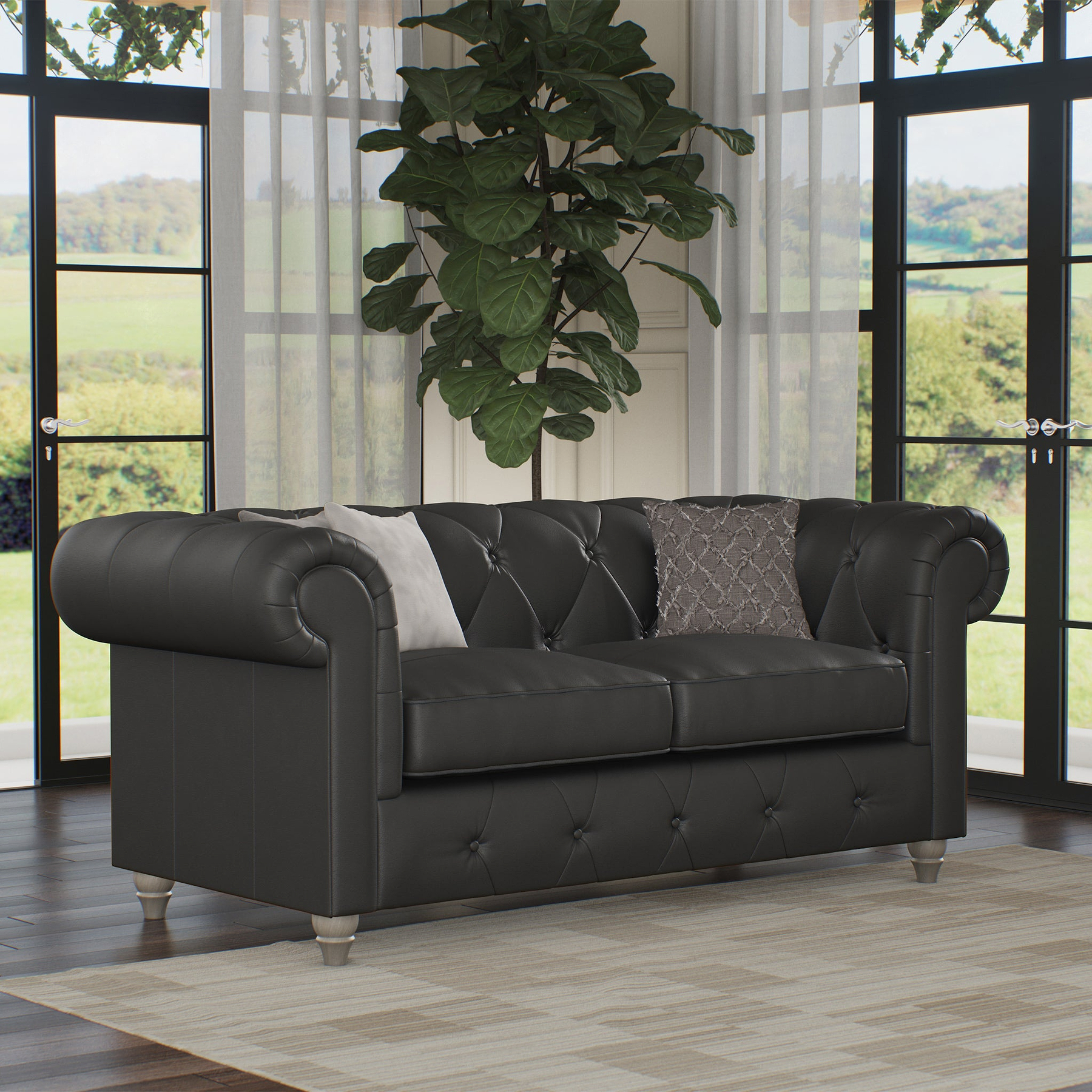 Everett Leather 2 Seater Sofa Raven Washed Feet from Roseland Furniture