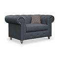 Everett Leather Snuggle Chair Navy Washed Feet from Roseland Furniture