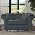 Everett Leather Snuggle Chair Navy Walnut Feet from Roseland Furniture