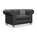 Everett Leather Snuggle Chair Raven Washed Feet from Roseland Furniture