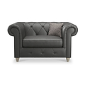 Everett Leather Snuggle Chair Raven Washed Feet from Roseland Furniture