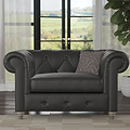 Everett Leather Snuggle Chair Raven Washed Feet from Roseland Furniture