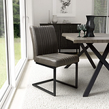 Branok Cantilever Grey Faux Leather Dining Chair from Roseland Furniture