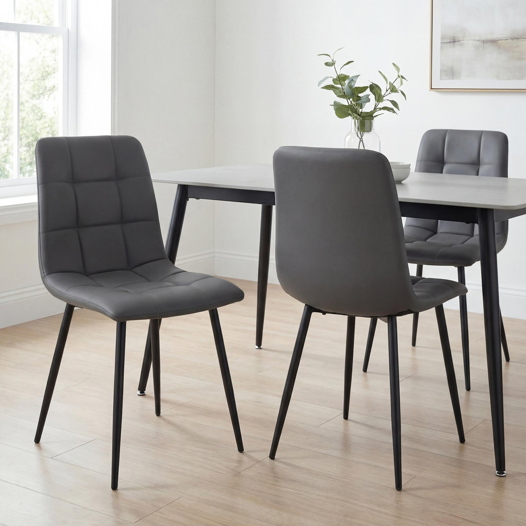 Gillan 120cm Ceramic Dining Table with 4 Dining Chairs from Roseland Furniture