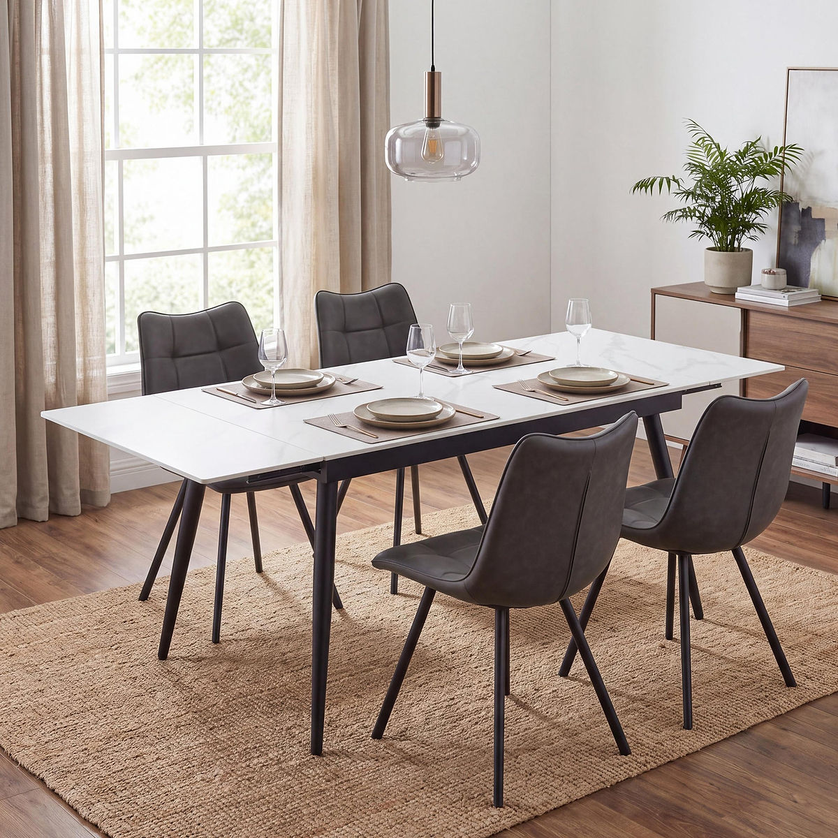 Avaston 120cm 180cm Extending White Table with 4 Zeno Dining Chairs from Roseland Furniture
