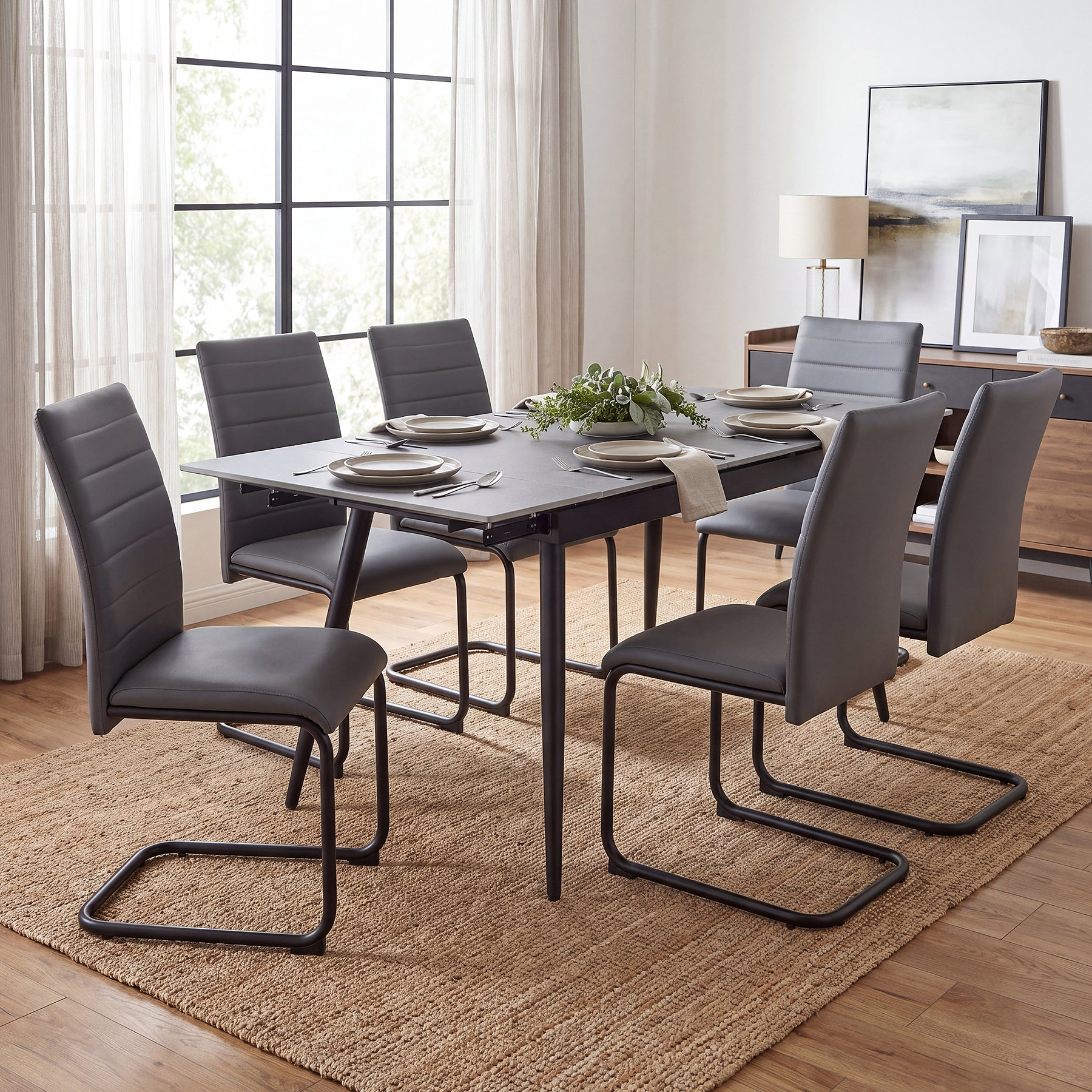 Avaston 120cm-180cm Grey Extending Table with 6 Grey Aeron Dining Chairs from Roseland Furniture