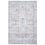 A rectangular, ornate rug with a faded beige and blue pattern, symmetrical designs and borders, displayed against a white background.