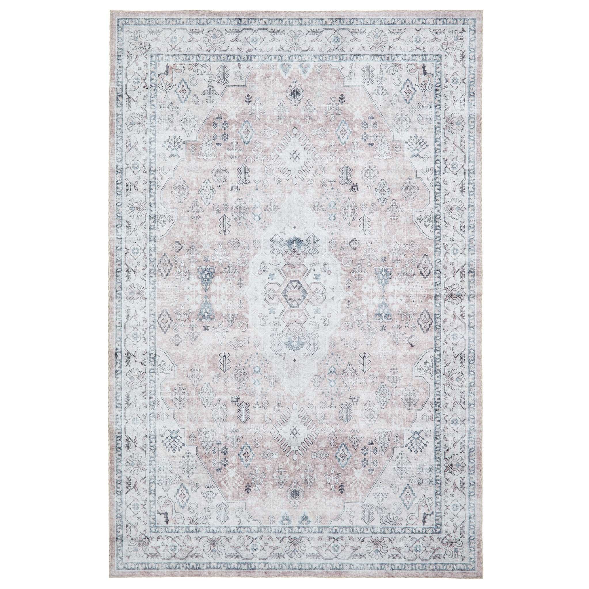 A rectangular, ornate rug with a faded beige and blue pattern, symmetrical designs and borders, displayed against a white background.