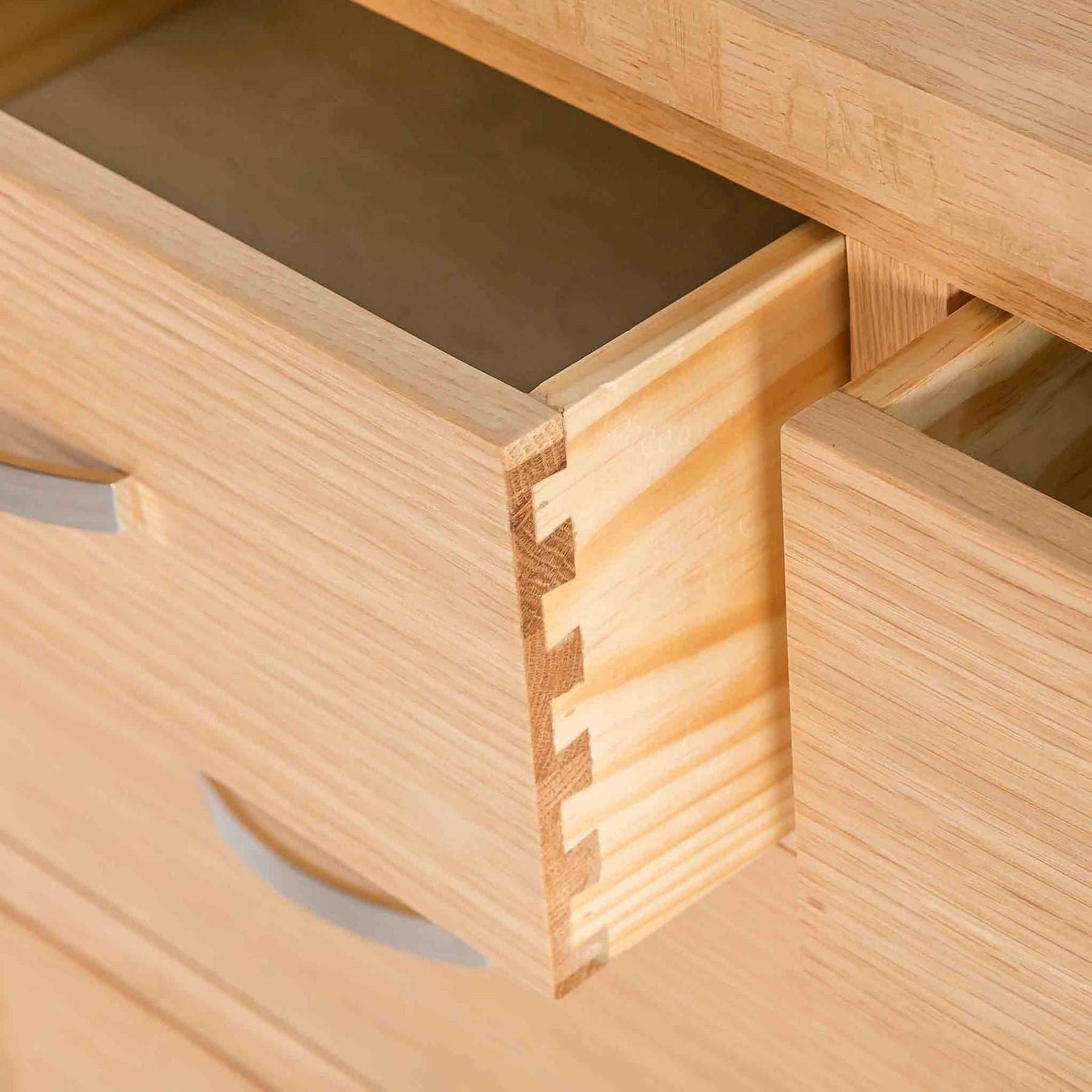 London Oak 2 over 4 chest of drawers with dovetail joints from Roseland Furniture