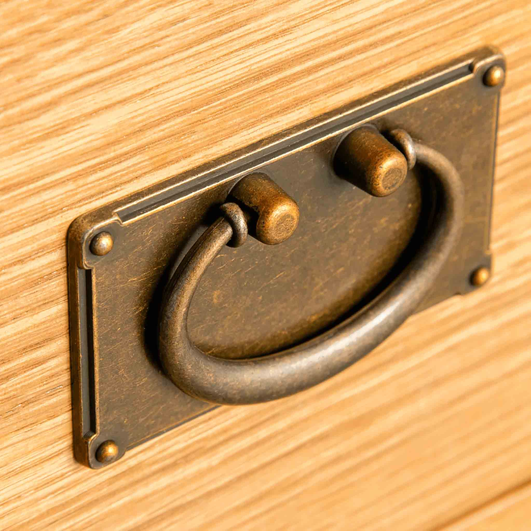 Surrey Oak close up of brass drop down handle