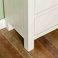 Close up of leg on The Cornish White Wooden Chest of 6 Drawers