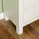 Close up of leg on The Cornish White Wooden Chest of 6 Drawers